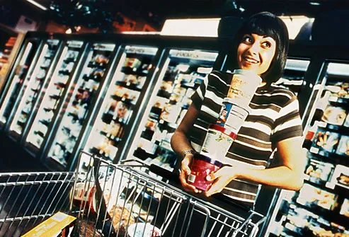 Woman loading cart with ice cream