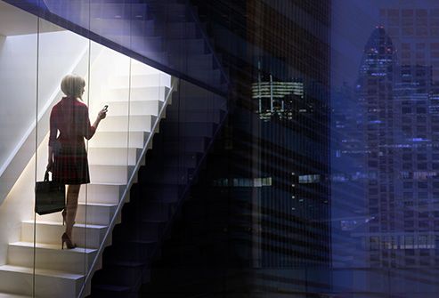 woman on stairs in office