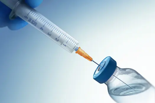 photo of syringe with vaccine