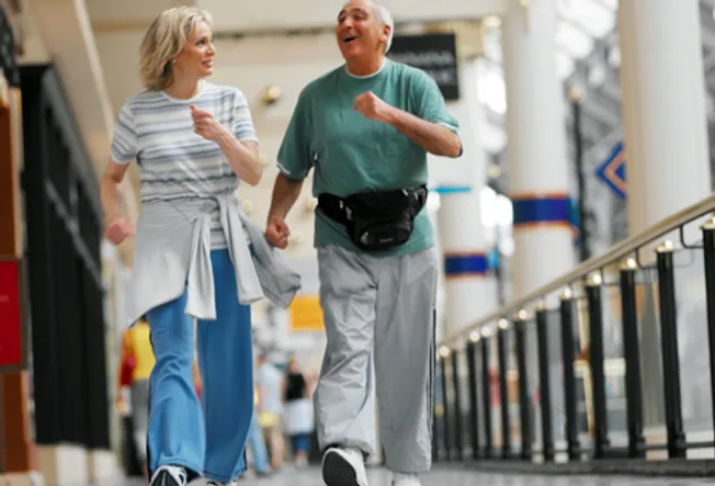 http://img.webmd.com/dtmcms/live/webmd/consumer_assets/site_images/articles/health_tools/RA_exercises_slideshow/getty_rm_photo_of_couple_powerwalking_in_mall.jpg