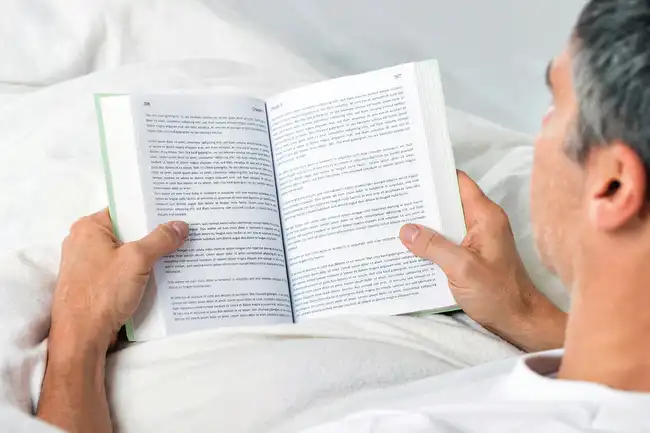 reading book in bed