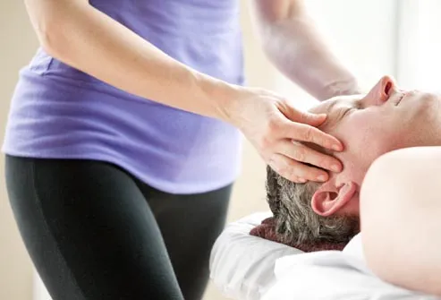 man receiving head massage