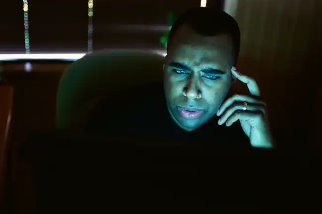 man staring at compute screen