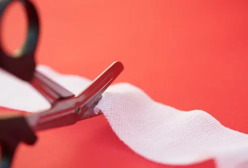 scissors cutting guaze bandage