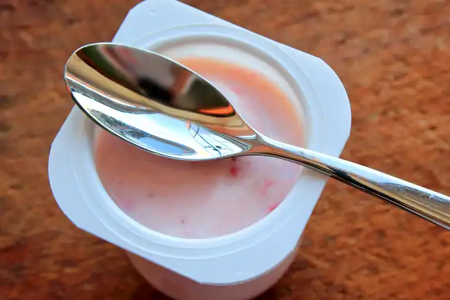 strawberry yogurt and spoon