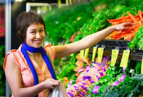 Woman shopping for vegetables