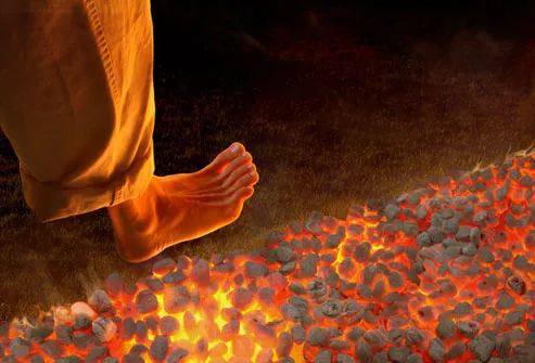getty rm photo of man walking on hot coals - درد منشا عصبی چیست ودرمانش چیست؟