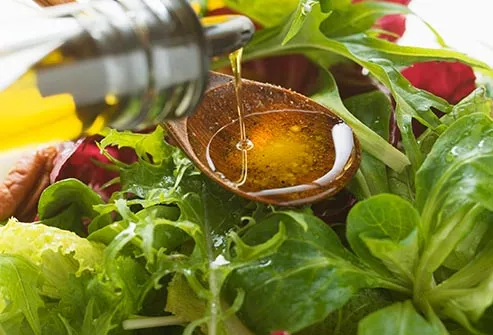 olive oil on salad