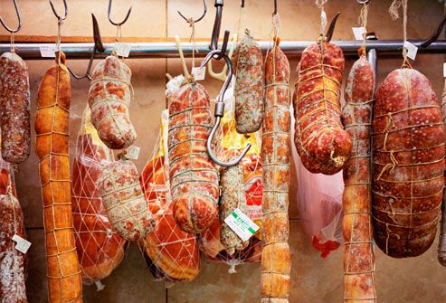 Salami and Sausages Hanging in Deli