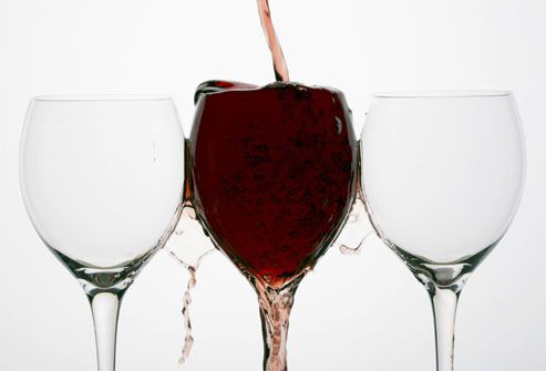 Red Wine Spilling Out of Glass