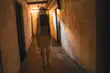 photo of ghost-like image of woman in hallway