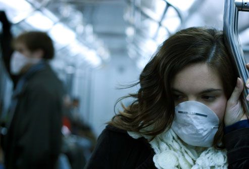 Woman Wearing Germ Mask in Subway