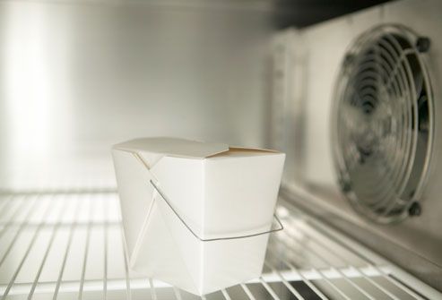 Takeout Carton In Empty Refrigerator