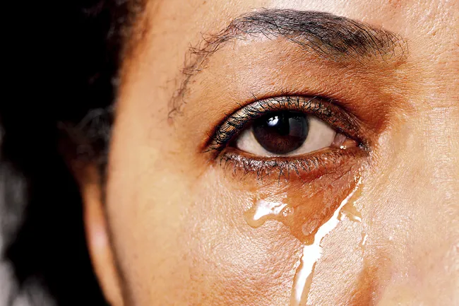 photo of woman crying