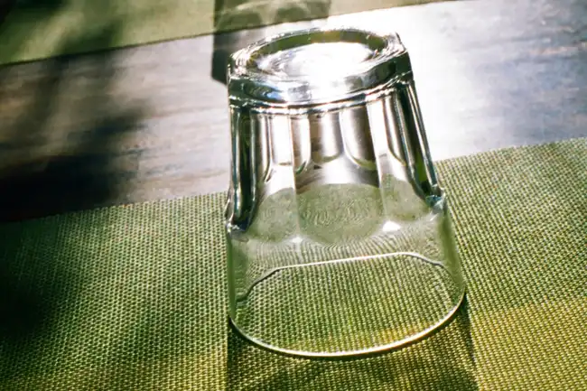 upside down glass on table