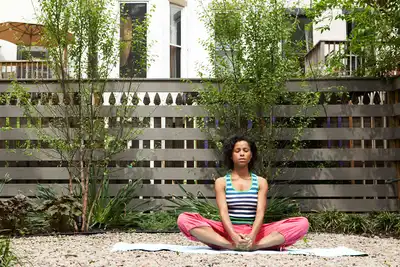 Woman Easing Stress by Meditating