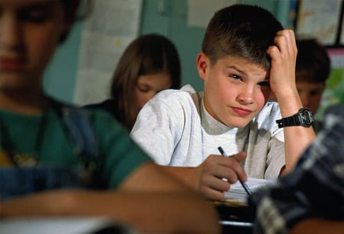 Teen boy stressed at school