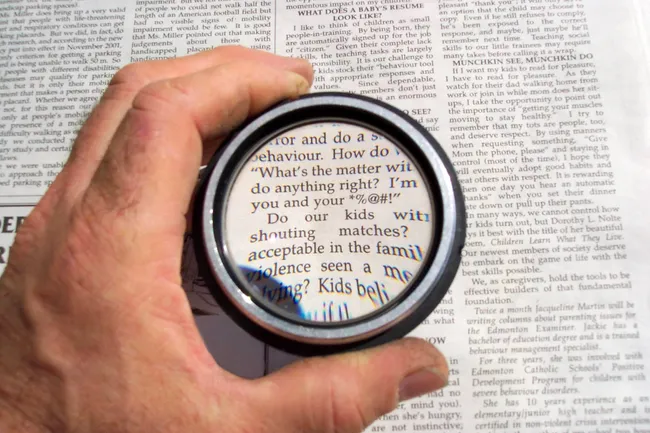 photo of using magnifying lens