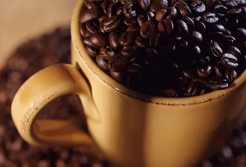 Coffee beans in mug