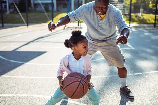 photo of grandfather plays basketball grandfather