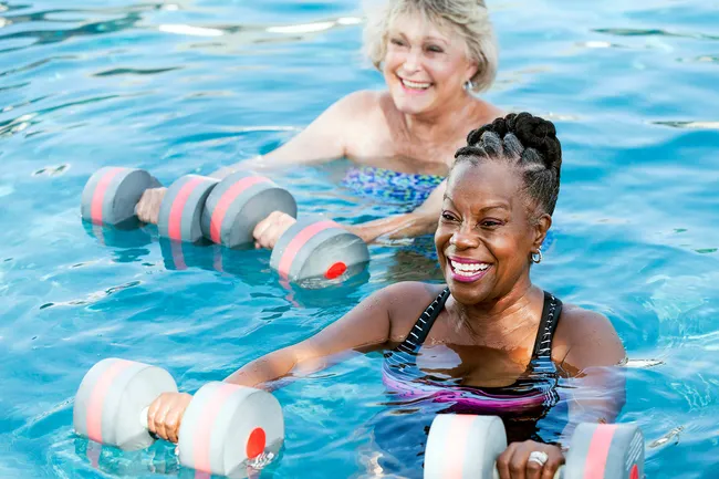 photo of senior women in water aerobics class