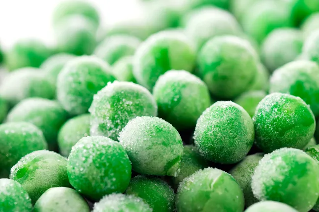 photo of frozen peas close up