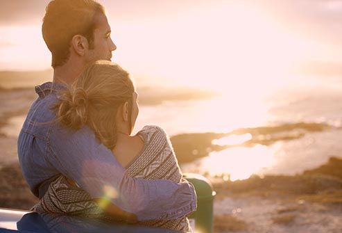 https://img.webmd.com/dtmcms/live/webmd/consumer_assets/site_images/articles/health_tools/genital_herpes_slideshow/getty_rm_photo_of_couple_hugging_by_ocean_view.jpg