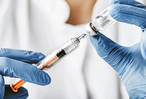 filling syringe from vial