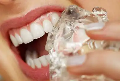 person chewing ice