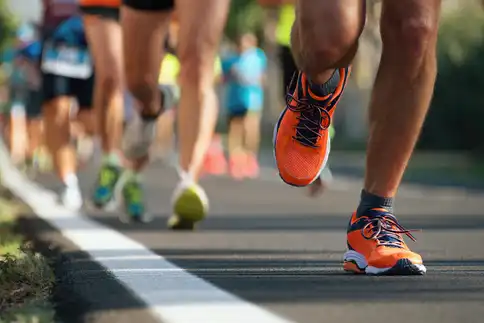 photo of marathon runners close-up of legs