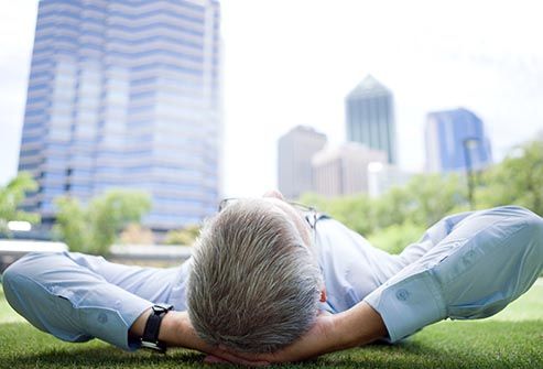 businessman relaxing in park