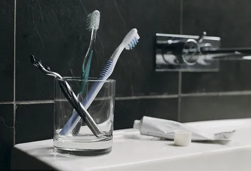 Toothbrushes and Razor By SInk