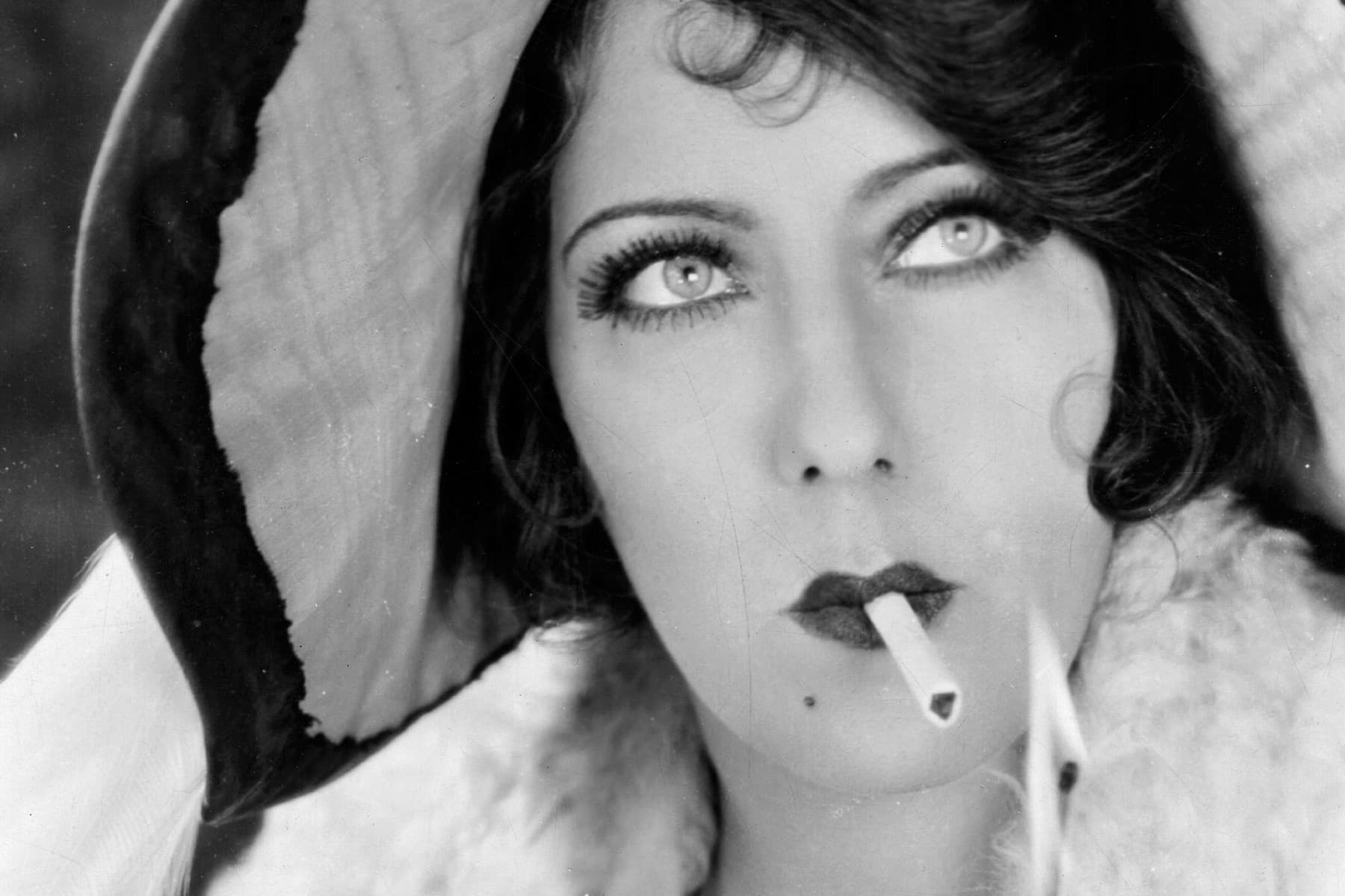 photo of gloria swanson smoking cigarette