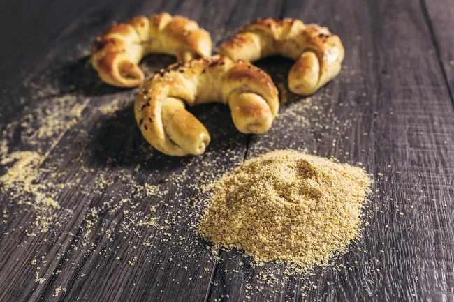 photo of wheat germ and baked rolls