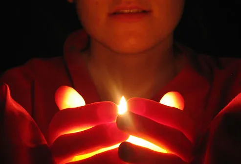 woman holding candle