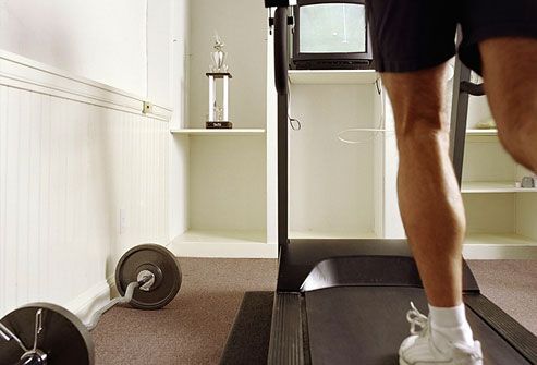 Man Working Out in Gym Room at Home