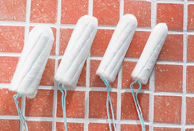 Tampons of various sizes in a row