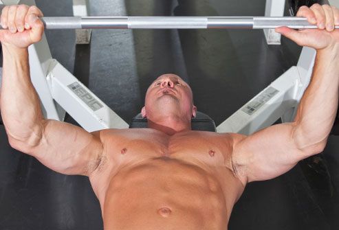 Trainer showing up position for benchpress