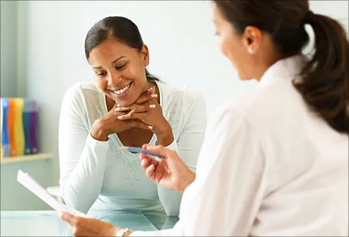 therapist talking enthusiactically with patient