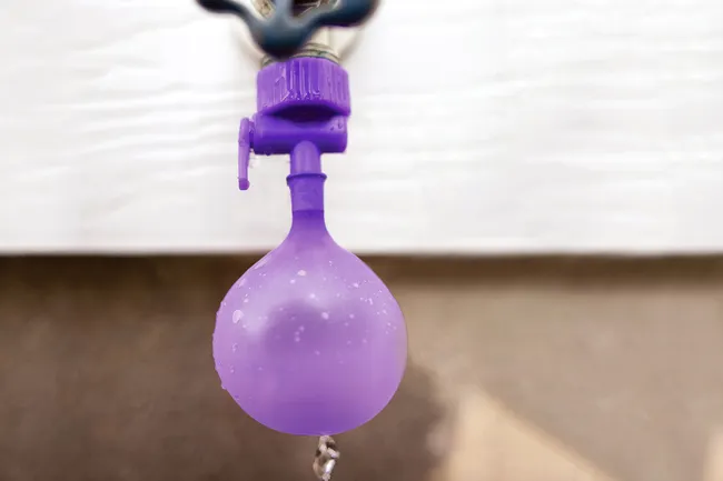 photo of filling water balloon