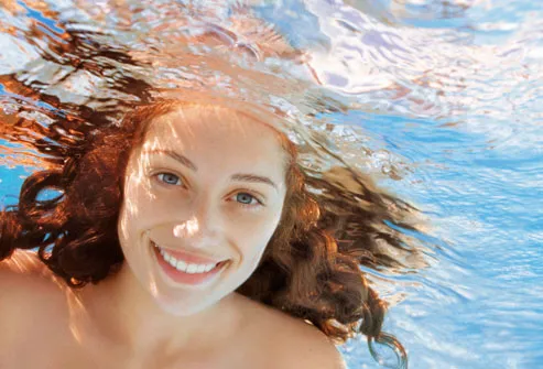 Woman Smiling Underwater
