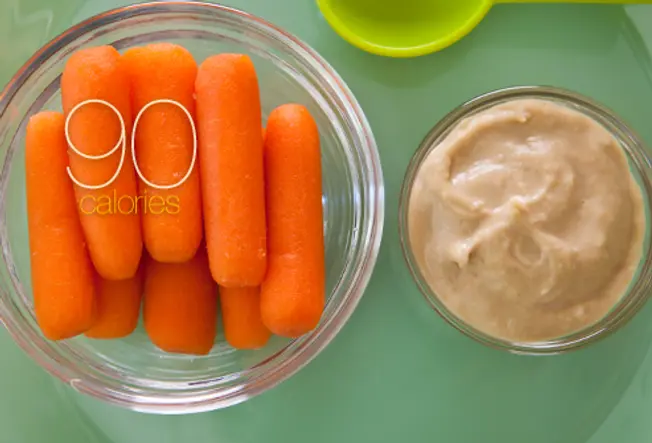Eight Baby Carrots with Hummus