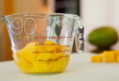 Measuring cup of mango