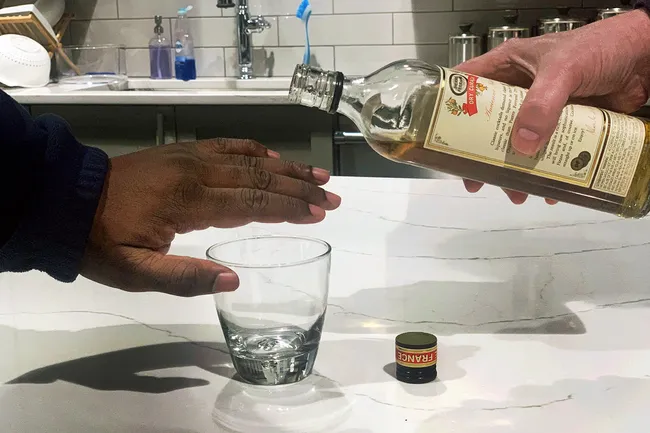 photo of hand refusing alcohol