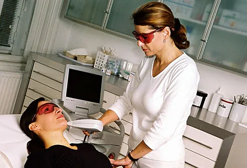 Woman receiving laser treatment