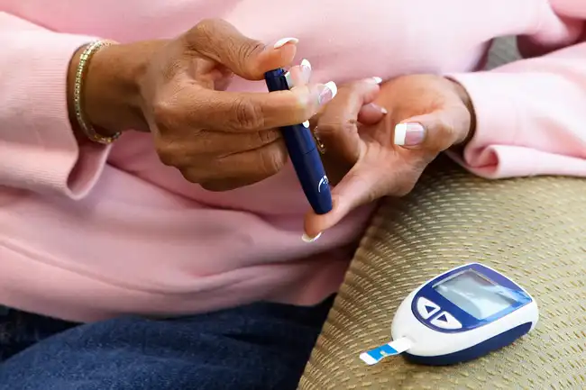 finger prick to test blood sugar
