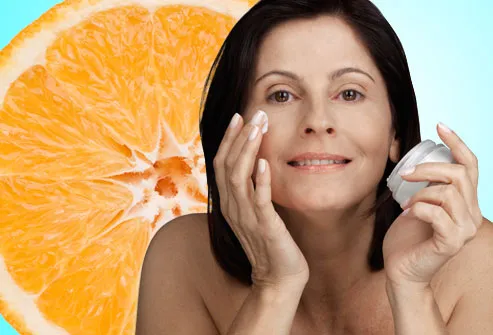 Woman Using Topical Vitamin C Skin Cream