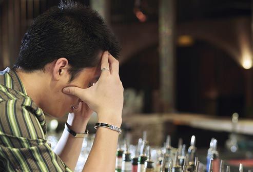 depressed man at bar