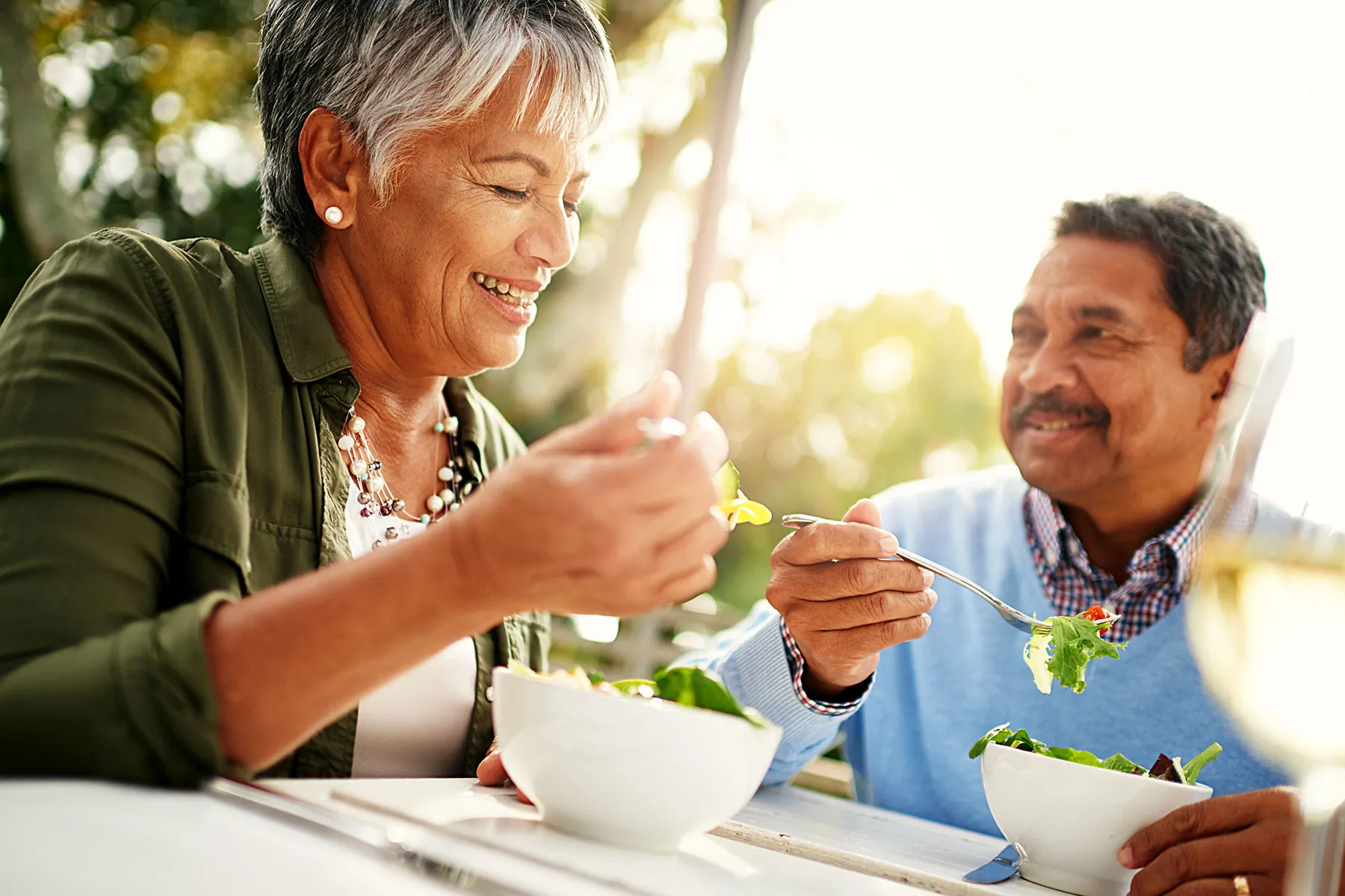 photo of mature couple eating