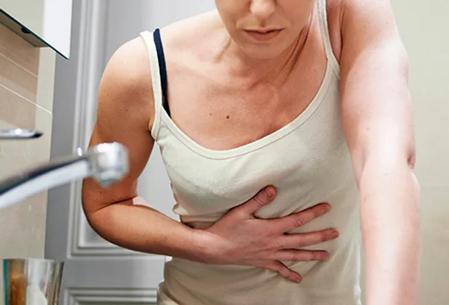 woman with upset stomach